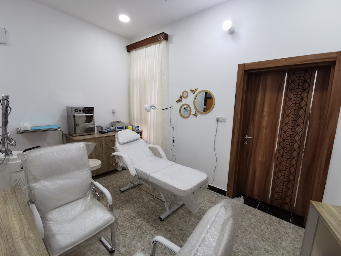 عيادة الجلدية والتجميل الدكتور مصطفى جواد عسكر